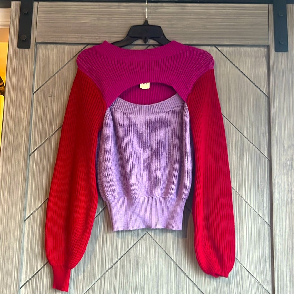 Perfect for Valentines. Open front knitted sweater, pink, purple, and red.